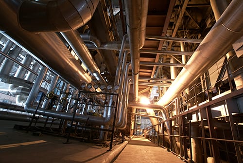 Equipment-cables-and-piping-as-found-inside-of-a-modern-industrial-power-plant-_k2432656