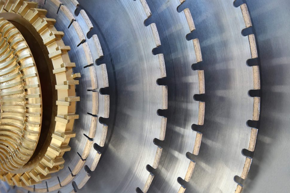 details of diamond teeth of a saw used to cut rock in the quarry