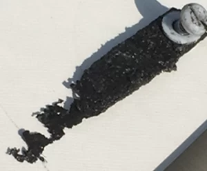 60-day mild steel corrosion coupon before treatment shows signs of severe fouling